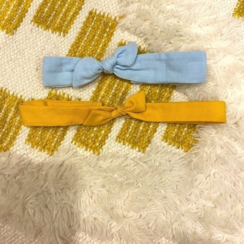 Set of three Wunderkin soft headbands.